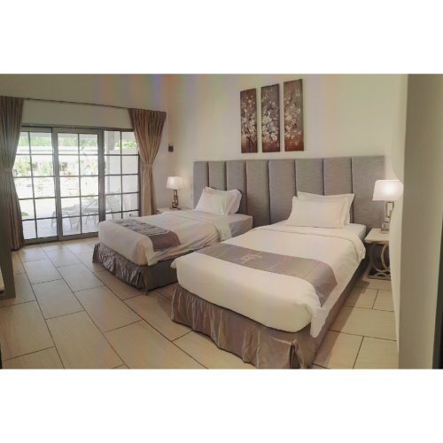 Standard Twin room with garden view