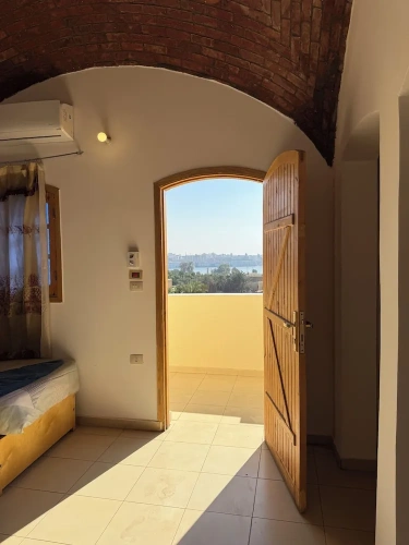 Standard Quadruple room with balcony and with garden view