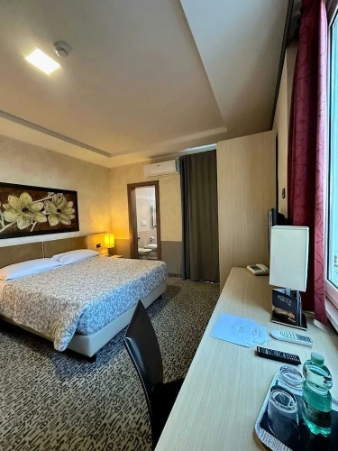 Deluxe Quadruple room with balcony