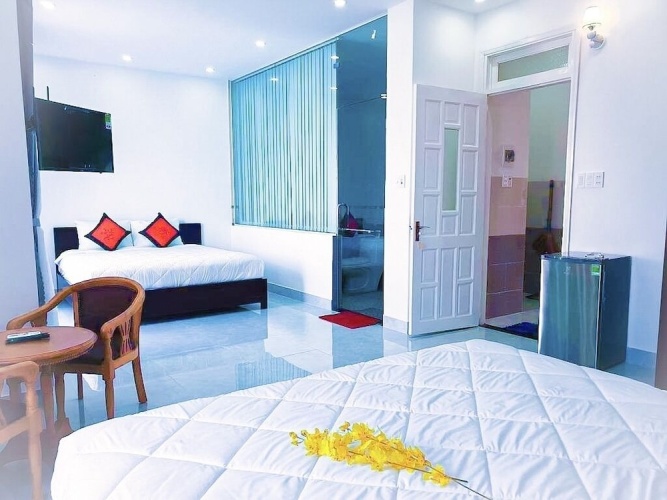 Standard Quadruple Family room with balcony and with garden view