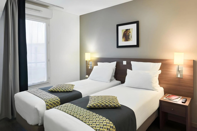 Zenitude Hôtel Résidences Roissy Village photo 8