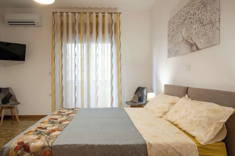 Standard Quadruple room with balcony and with city view