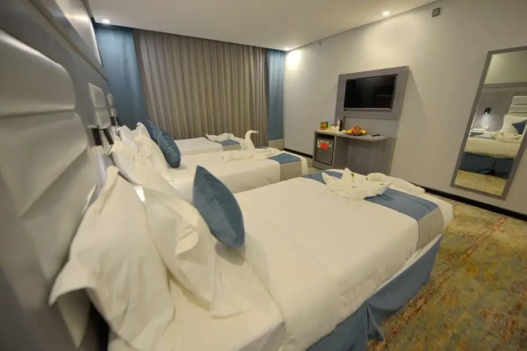 Standard Quadruple room with city view