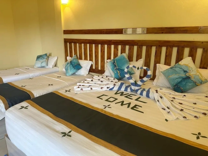 Deluxe Quadruple room with balcony