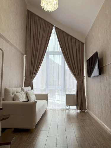 Фотография номера квартиры Апартаменты Dombay Flats