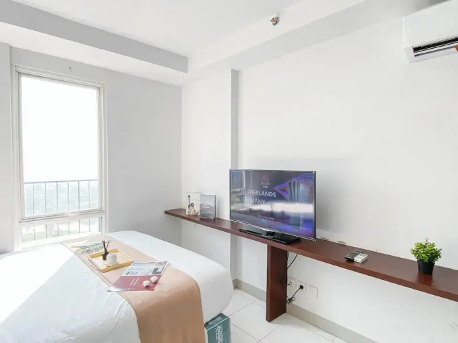 Basic Studio Room At Azalea Suites Apartment