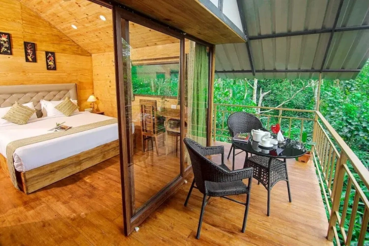 Cottage with balcony and with garden view