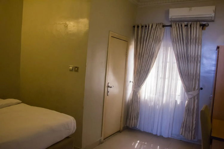 Triple Tee Hotel