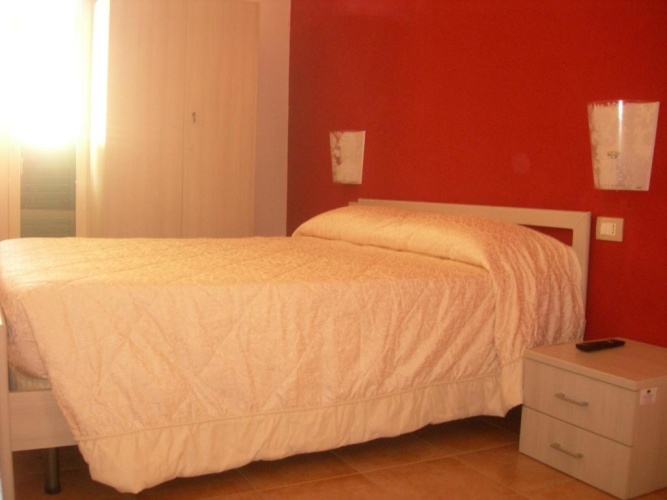 Standard Quadruple room with balcony and with garden view