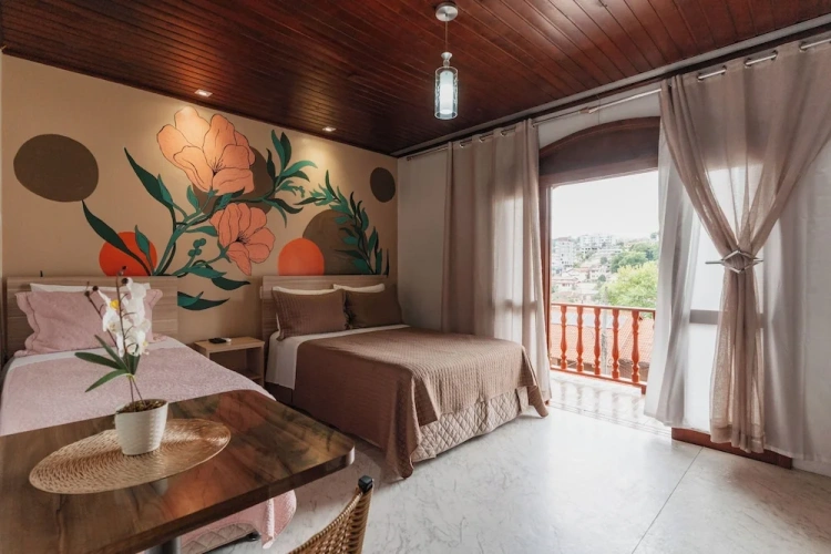 Luxury Quadruple room with balcony and with city view