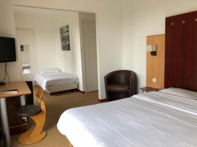 Standard Quadruple room with garden view