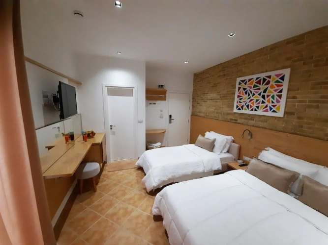 Superior Quadruple room with balcony and with sea view