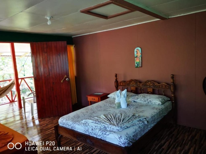 Standard Triple room with garden view