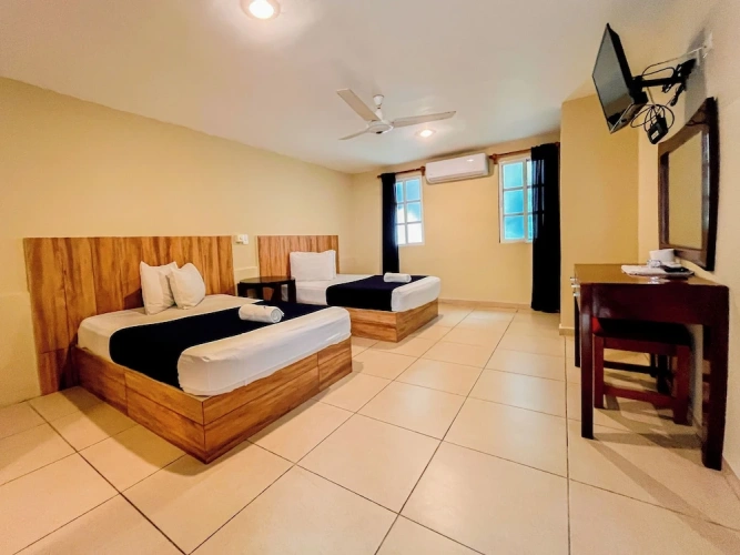 Standard Quadruple room with courtyard view