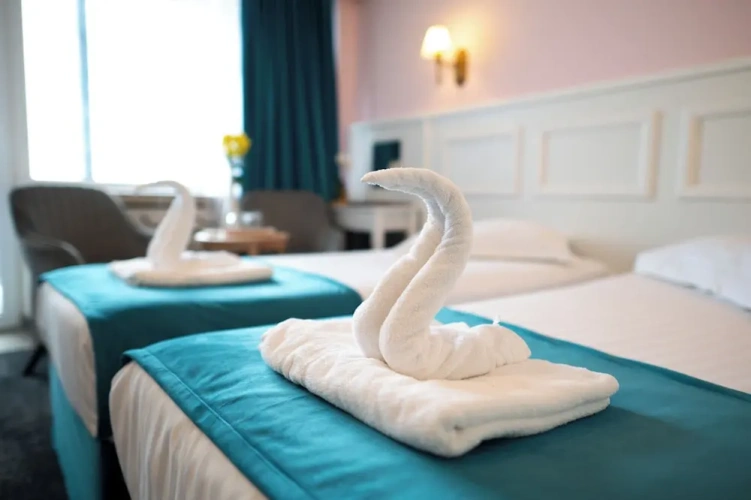 Superior Quadruple room with balcony and with partial sea view