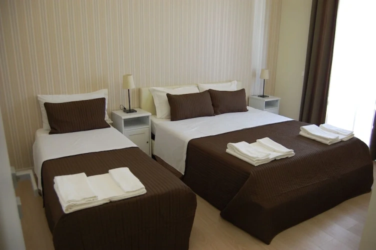 Standard Triple room with balcony and with city view
