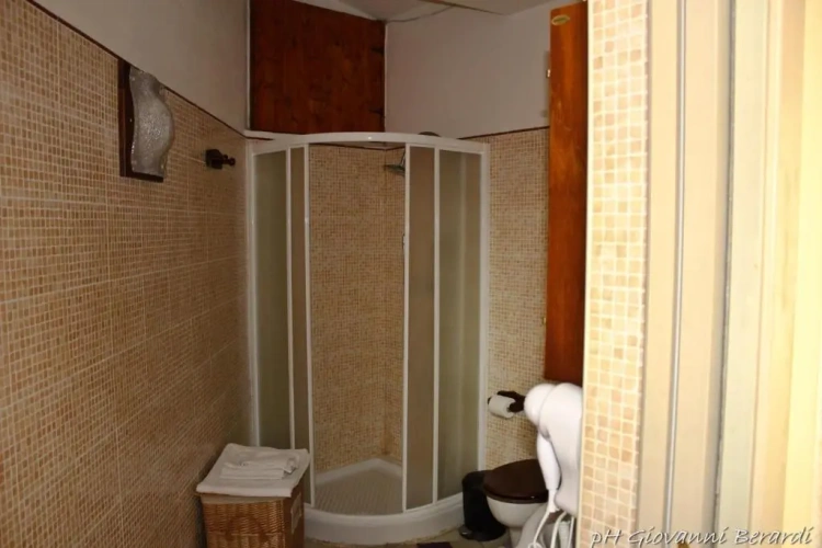Standard Triple room with garden view