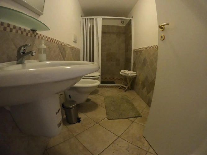 Standard Quadruple room with courtyard view