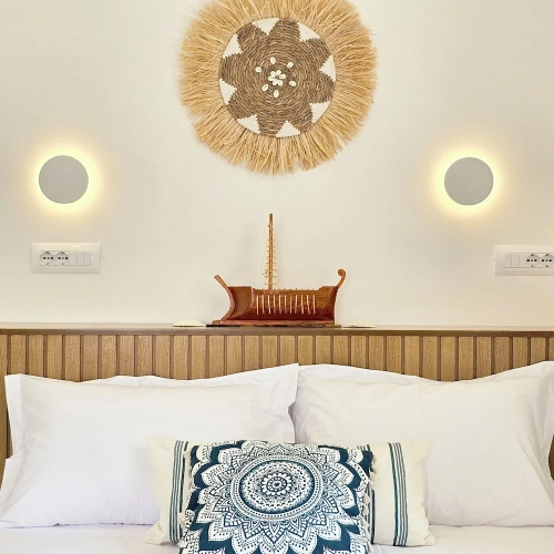 Deluxe Quadruple room with balcony and with partial ocean view