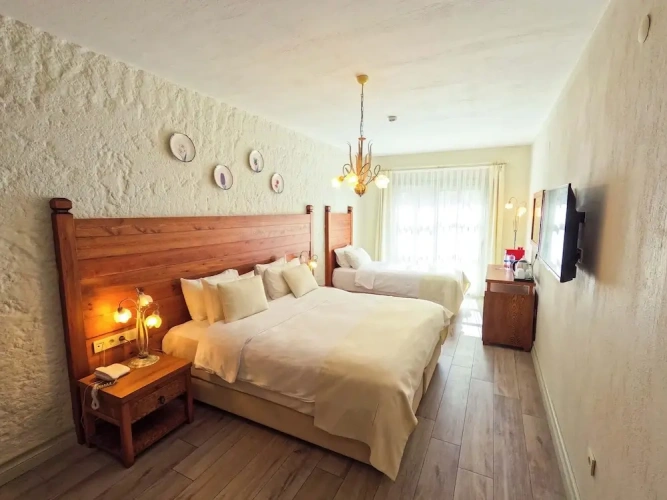 Deluxe Triple room with garden view
