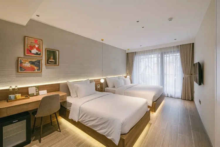 Standard Triple Family room with balcony and with city view