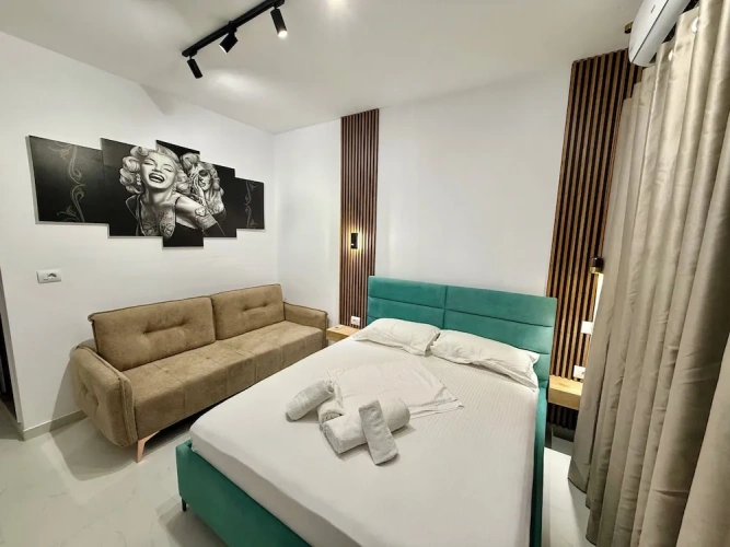 Deluxe Triple room with balcony and with pool view