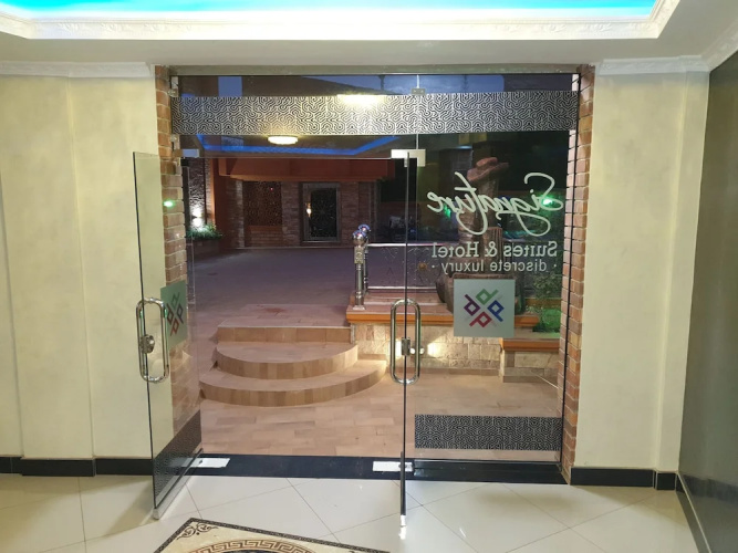 Signature Suites & Hotel