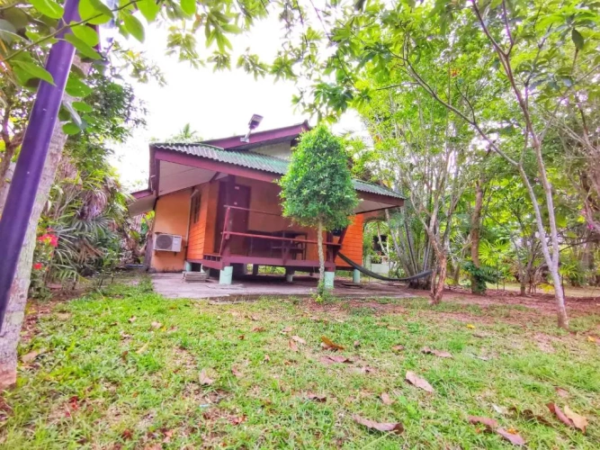 Bungalow with balcony and with garden view