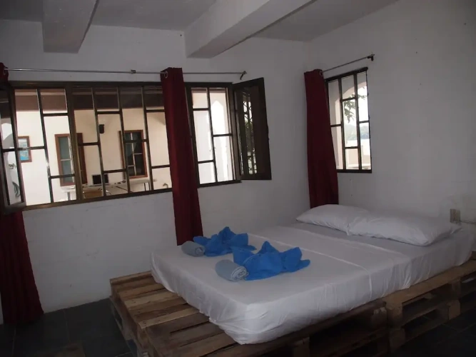 Standard Triple room with garden view