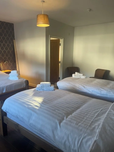 Deluxe Quadruple room with courtyard view