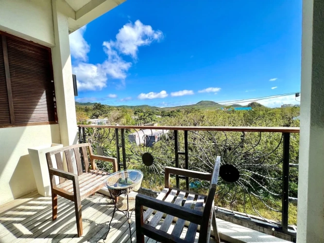 Deluxe Quadruple room with balcony