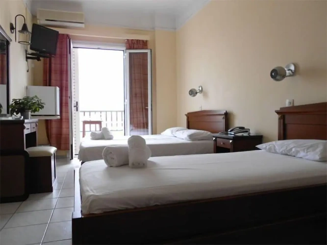 Standard Triple room with balcony and beachfront