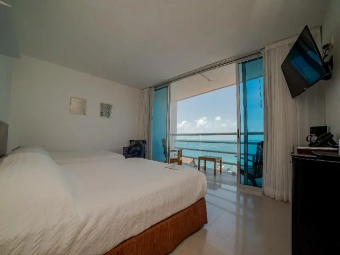 Deluxe Quadruple room with balcony