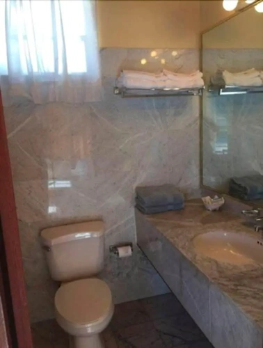 Deluxe Quadruple room with balcony