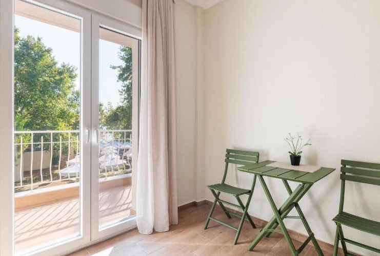 Apartment with balcony and with garden view