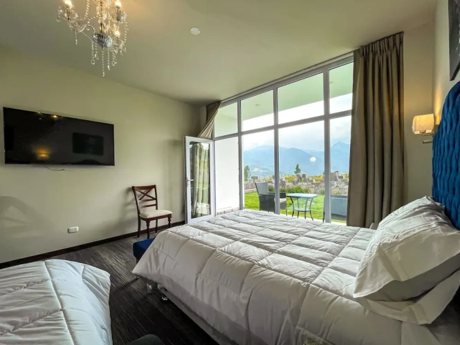 Superior Quadruple room with balcony and with mountain view