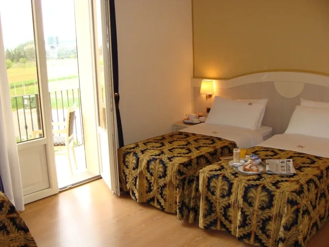 Standard Triple room with balcony