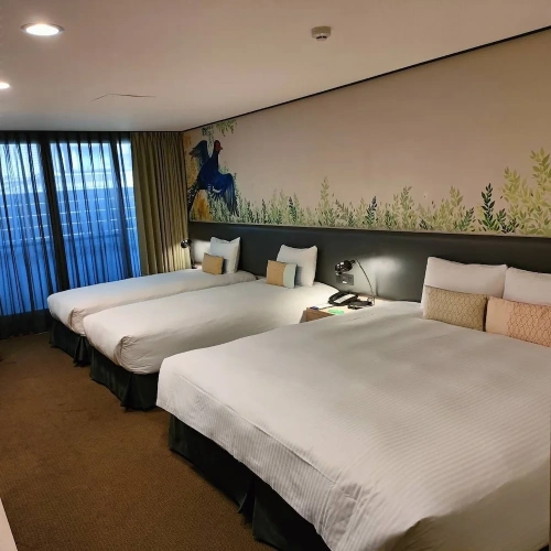 Deluxe Quadruple room with balcony