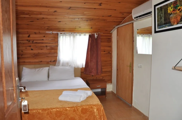 Standard Triple room with balcony and with garden view