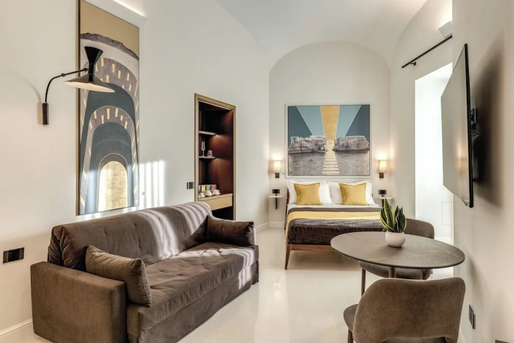 Executive Quadruple room with balcony and with city view