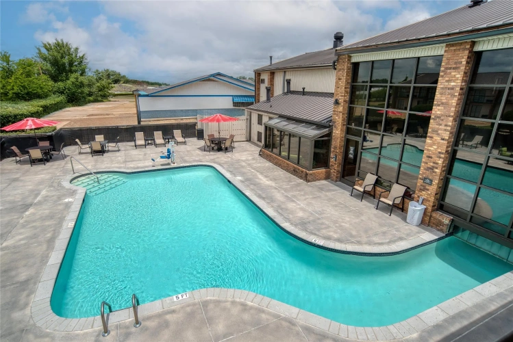 Double Suite with balcony and with pool view