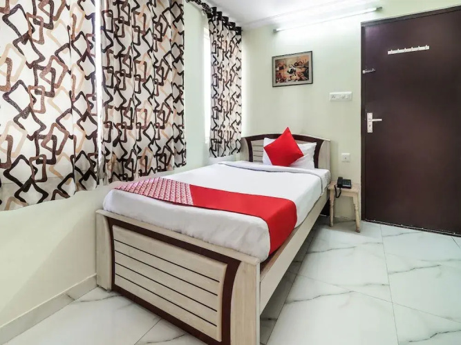 Om Hotel by OYO Rooms