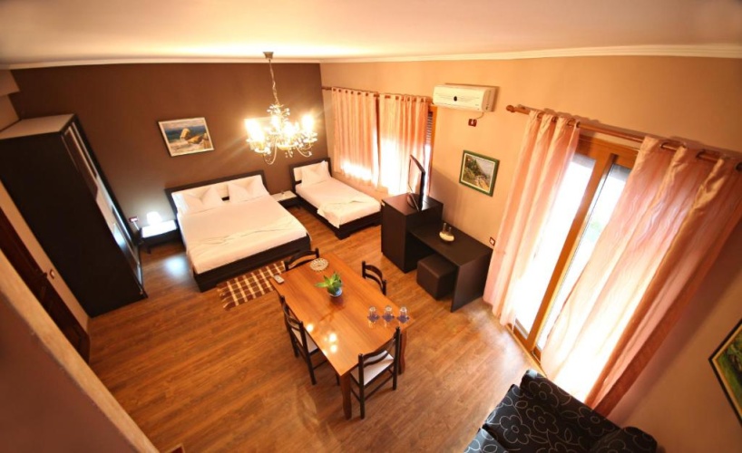 Deluxe Triple room with balcony and with sea view
