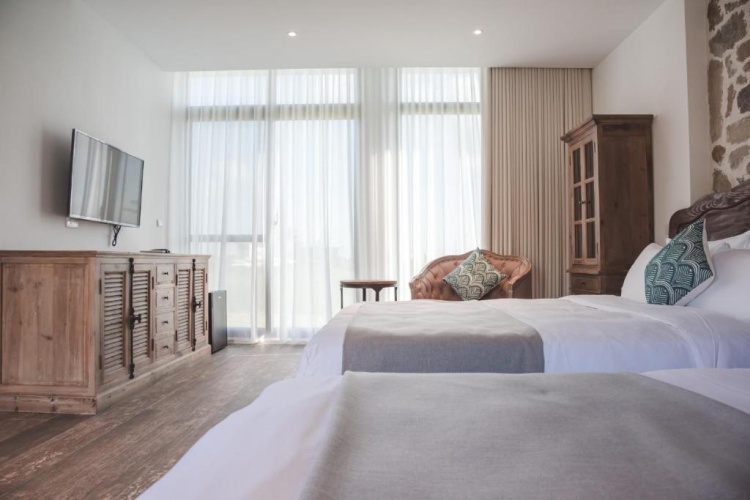 Standard Quadruple room with garden view
