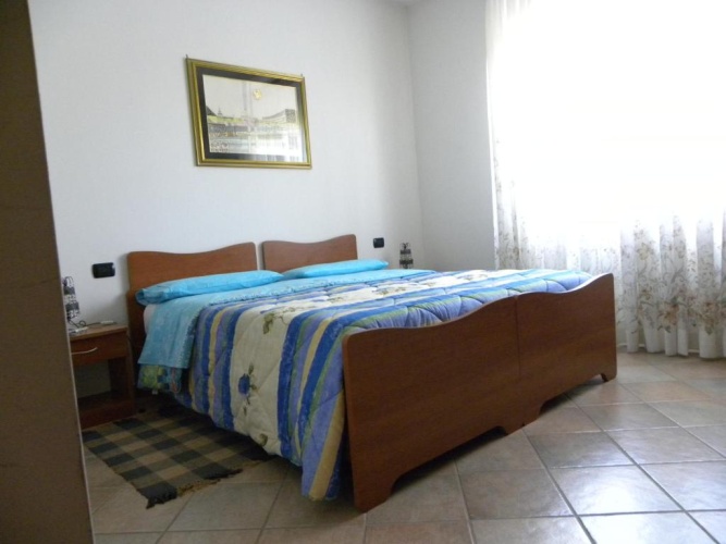 Standard Triple room with garden view