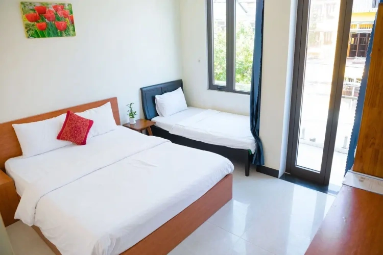 Standard Triple Family room with balcony and with city view