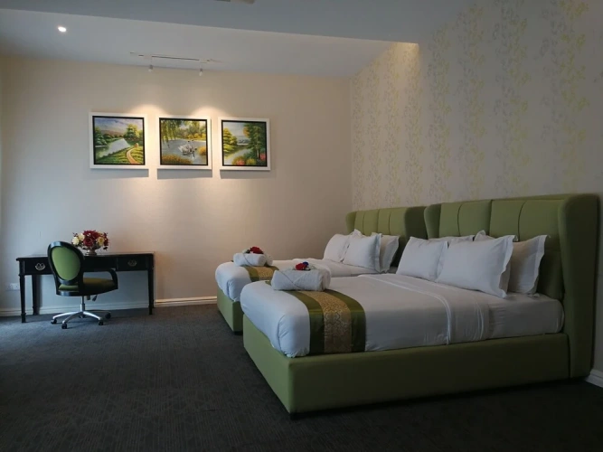 Standard Quadruple Family room with balcony and with garden view
