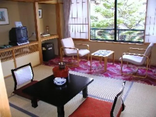 Standard Triple room with garden view