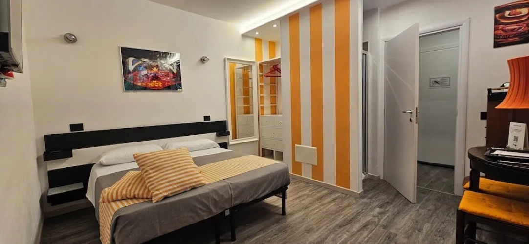 Standard Triple room with courtyard view