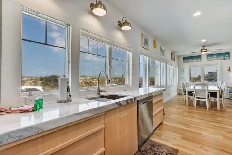 Dog Friendly Beachfront Condo, Direct Access to Beach by RedAwning